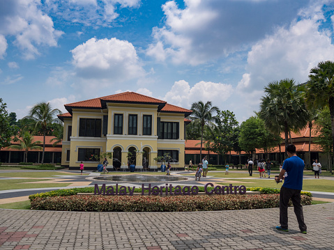 Singapore, Singapore - April 10, 2016: Tourist taking photos of the main building of Malay Heritage Centre.