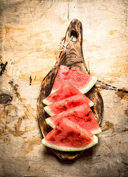 istock Sliced pieces of watermelon on the Board. 599490800