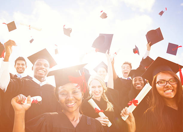 istock Diverse International Students Celebrating Graduation Concept 599490874