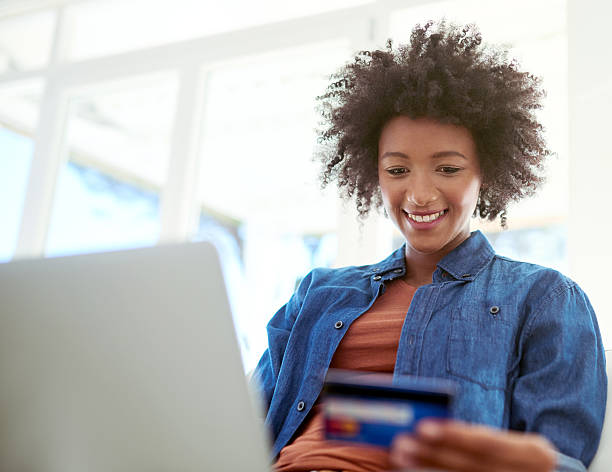 istock Spending money from the comfort of her sofa 599493314