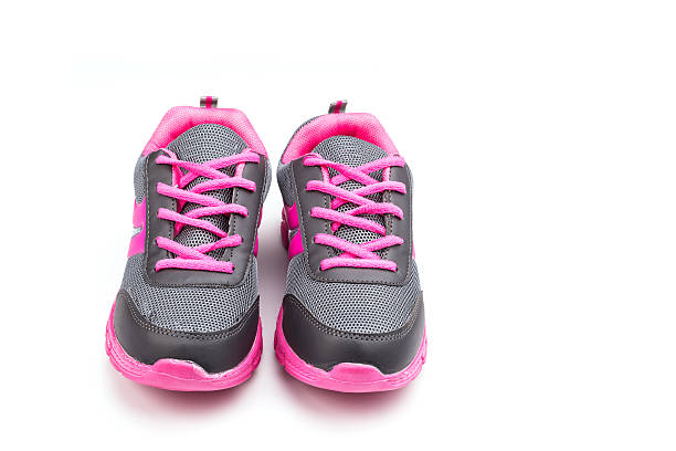 istock Pink sport shoe isolated on white background 599494070