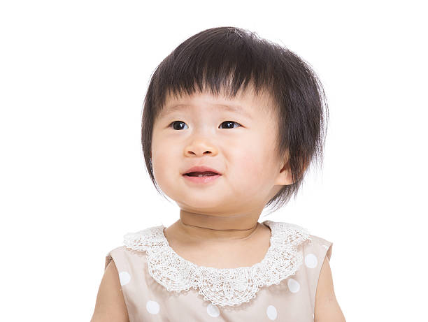 istock Asian baby girl playing 599500120