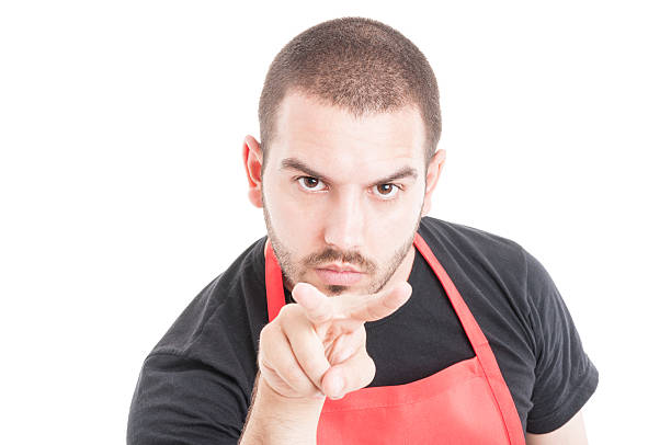 istock Close-up of handsome employee watching you 599502984