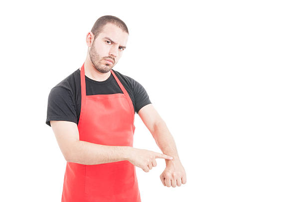 istock Serious employee pointing his wrist 599503058