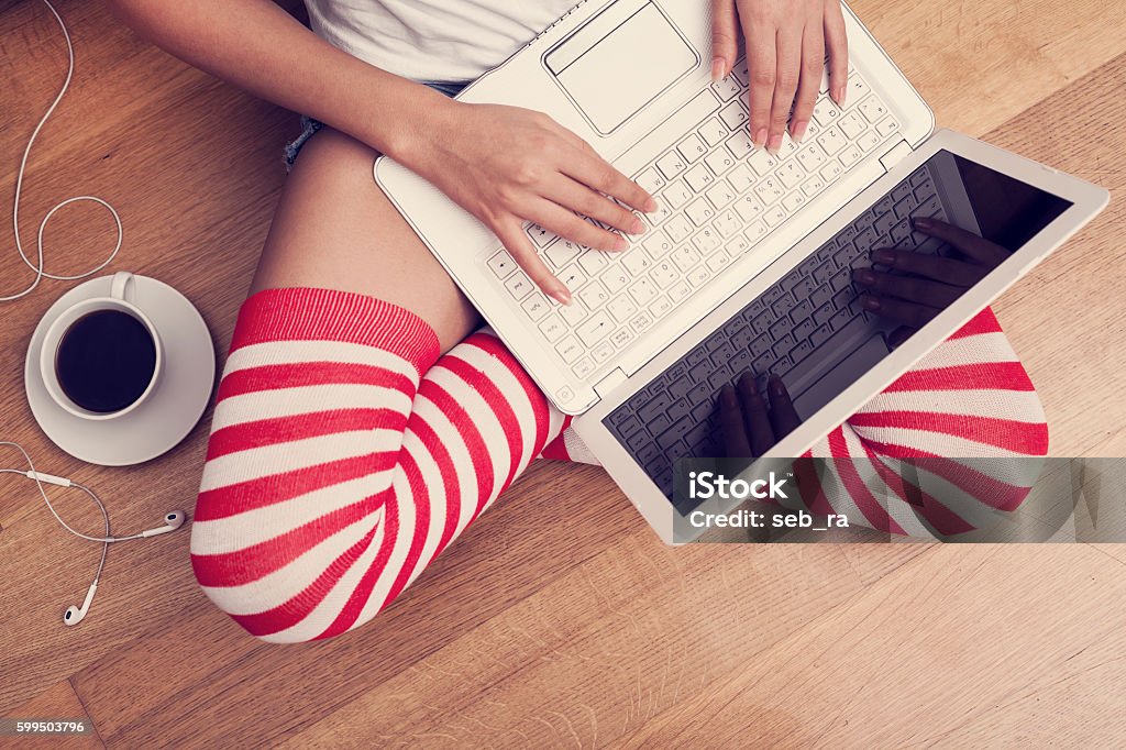 Legs At Computer Female Legs On A Floor With Computer Laptop Stock Photo - Download ...