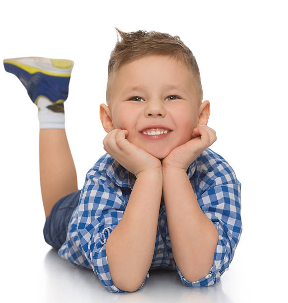 istock The boy lies on the floor 599504910