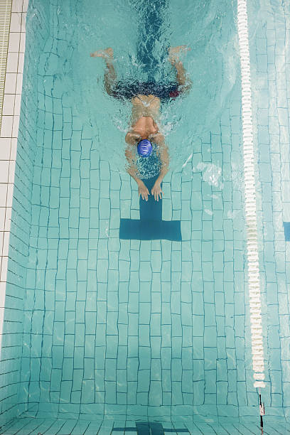 istock Swimmer doing the breaststroke in swimming pool 599673714