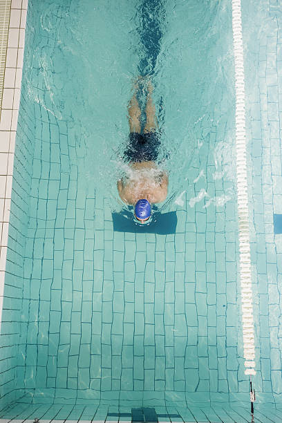 istock Swimmer swimming in the pool 599673720