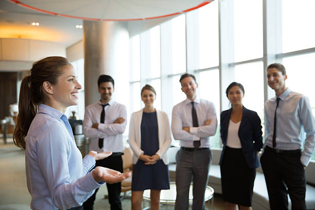istock Successful Businesswoman and Team 599676312