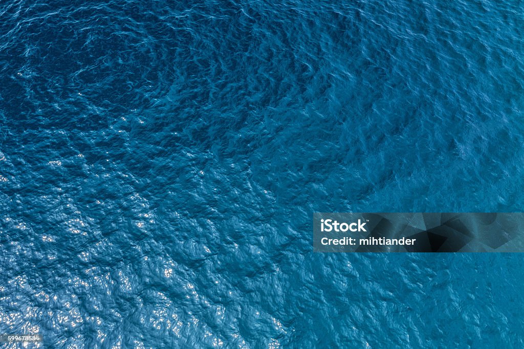 Sea floor Aerial shot of clear sea water surface with sea floor Sea Stock Photo