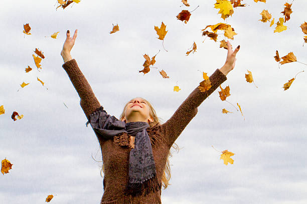 istock Happy woman in fall 599682226