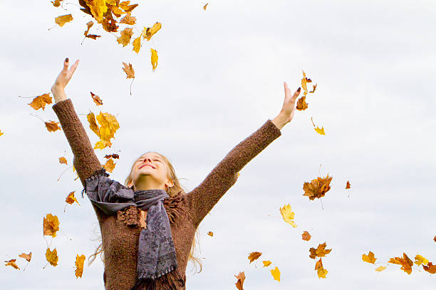 istock Happy woman in fall 599682574