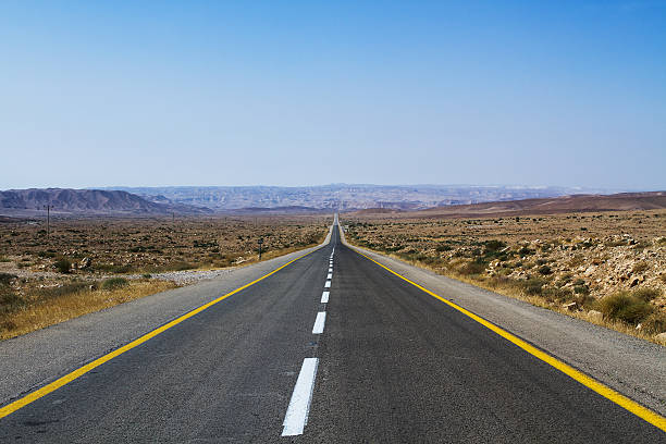 istock Beautiful road in the desert 599685228