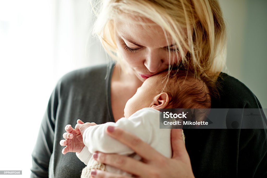 I never thought I could love one being so much Shot of a mother spending time with her newborn baby Mother Stock Photo