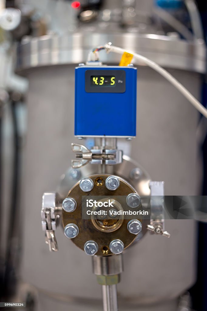 Pressure and temperature indicator on the instrument particle accelerator, the machine study the particles, a powerful computer in a laboratory study of the properties of materials Activity Stock Photo