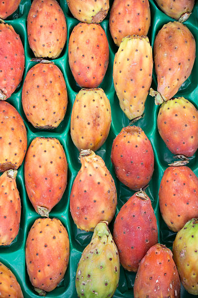istock Fruits of prickly pear cactus on a market. 599692612