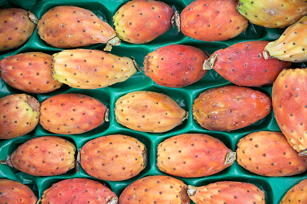istock Fruits of prickly pear cactus on a market. 599692822