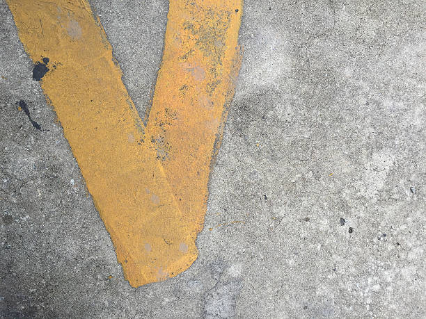 istock Concrete road with yellow stripe 599694694