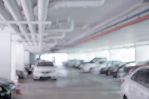 istock Blur underground car park white colors. 599694950