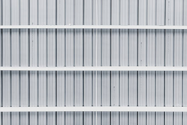 istock Metal sheet and Steel Beams under warehouse roof structure pattern. 599695730