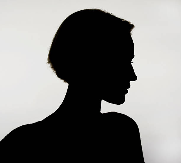 istock silhouette of young woman 599696828
