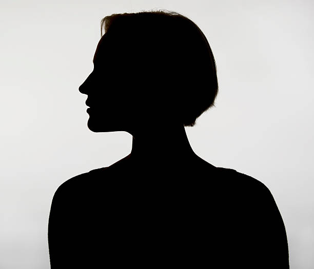 istock silhouette of young woman 599696966