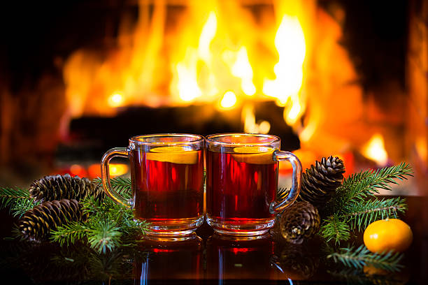 istock Mulled wine or hot drink, christmas decoration, fireplace 599698230