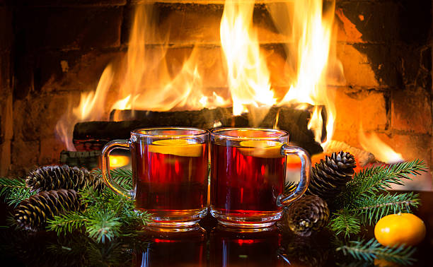 istock Mulled wine or hot drink, christmas decoration, fireplace 599698798