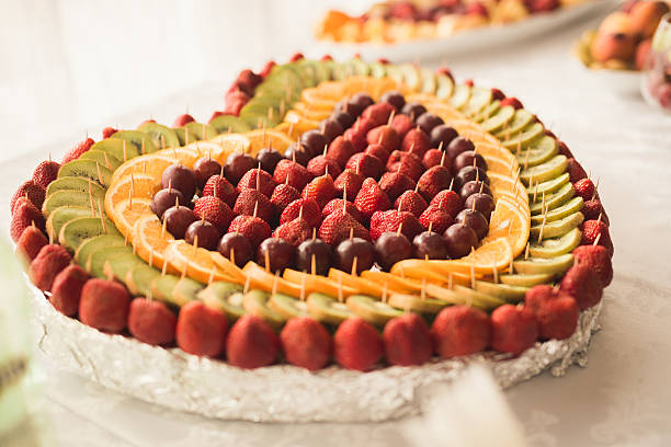 Authentic buffet, assorted fresh fruits, berries and citrus. Preparation for