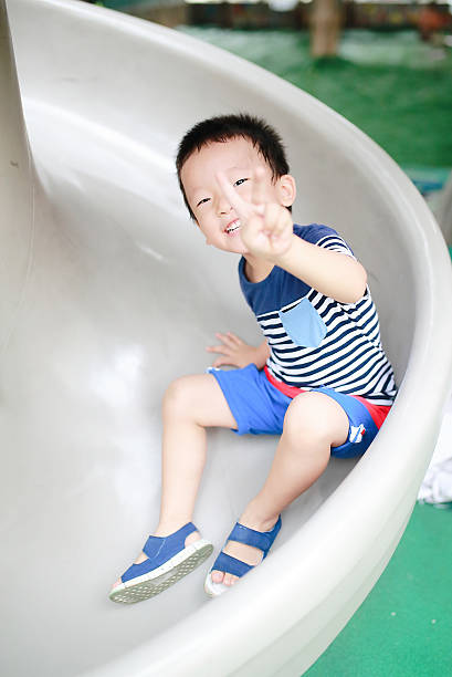 istock Cute Asian child in the Playground 599704562