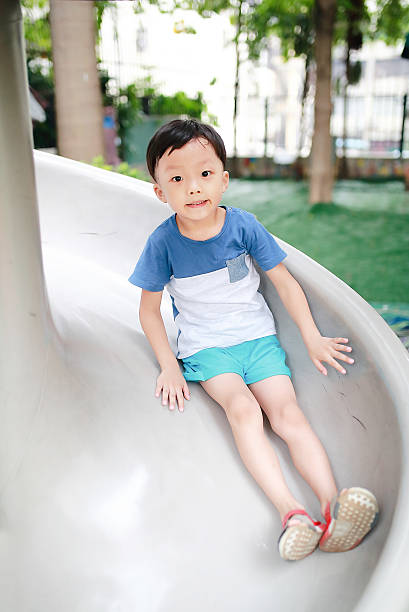 istock Cute Asian child in the Playground 599704592