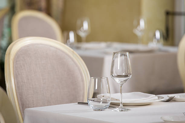 istock Empty glasses and plates installed in the restauran 599704930