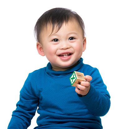 Portrait of Chinese toddler with building blocks