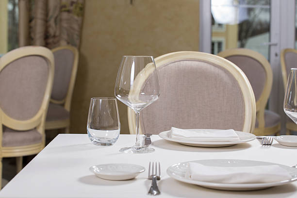 istock Empty glasses and plates installed in the restauran 599706584