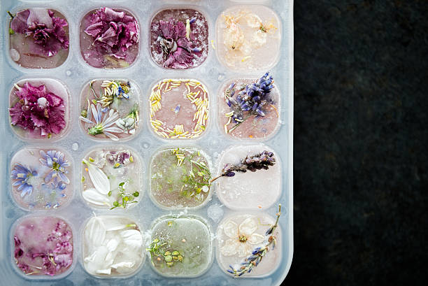 istock Tray with Frozen Flowers in Ice Cubes 599708434