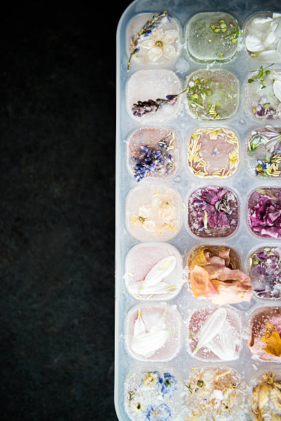 istock Tray with Frozen Flowers in Ice Cubes 599708596