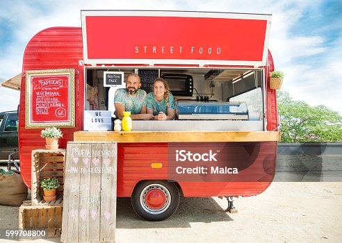 istock Food truck and owners 599708800