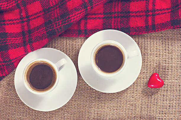 istock Coffee and plaid. The atmosphere for a cozy romantic evening. 599710480