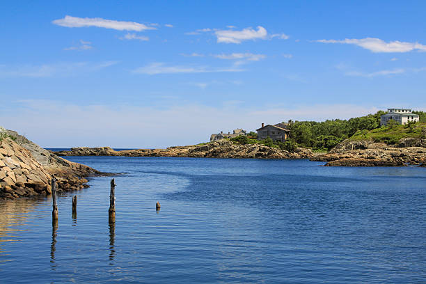 istock Harbor View, Rocks and Waterfront Houses, Perkins Cove, Ogunquit, Maine. 599711720