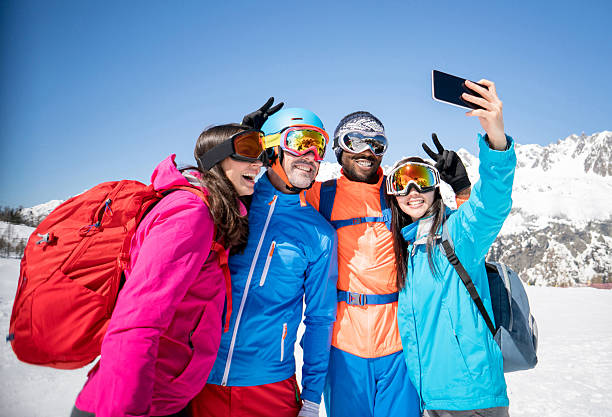 istock Group of friends taking a selfie skiing 599712100