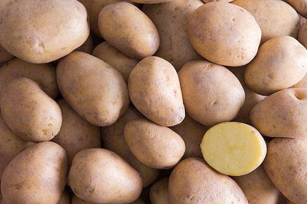 istock Golden Potatoes with One Cut in Half 599712940
