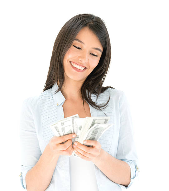 Happy woman counting cash