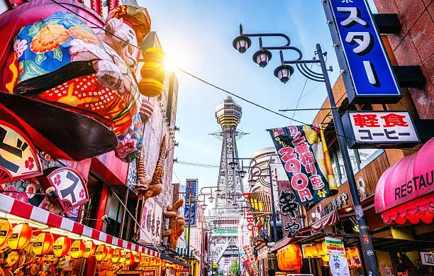 Osaka Tower and view of the neon advertisements Shinsekai district 