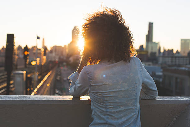 istock Girl posing in the sunset 599717376