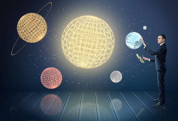 istock Businessman touching 3d planets of the Solar System, surrounded by 599717400
