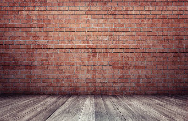istock Rendering of interior with red brick wall and wooden floor. 599748630