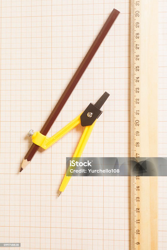 Drawing Board Ruler Compass Drawing Compass With Black Pencil And Ruler On Graph Paper Stock Photo ...