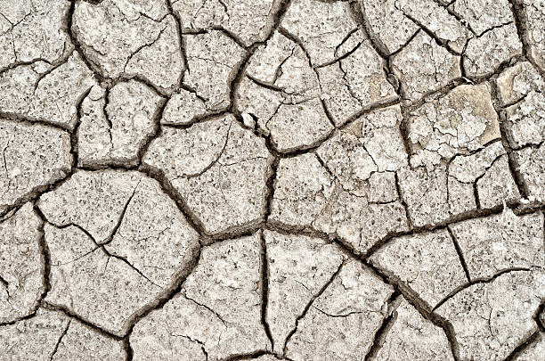 istock Texture cracked, dry the surface of the earth. 599751588