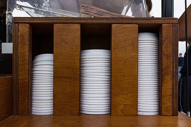 Photo of Stacked Coffee Lids Holder Increasing Pattern