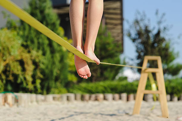 istock Girl walking on the sling 599754032